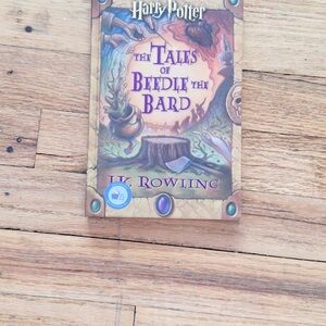 The Tales of Beedle the Bard by J.K. Rowling, part of the Harry Potter universe.